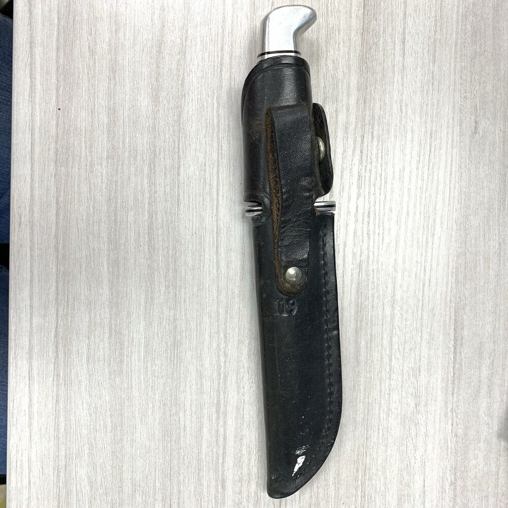Buck Knife 119 1998 Fixed Blade Knife Black Handle Black Leather Sheath USA.